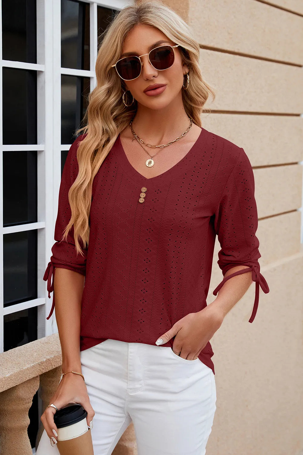 Burgundy eyelet top with V neckline, half sleeves and sophisticated casual appeal