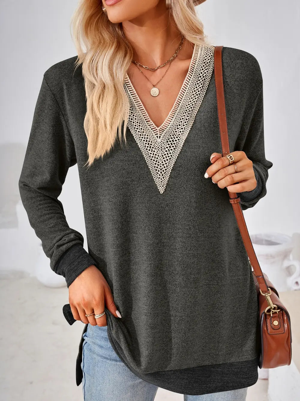 Charcoal crochet contrast V neck long sleeve top with decorative lace trim and side slit design