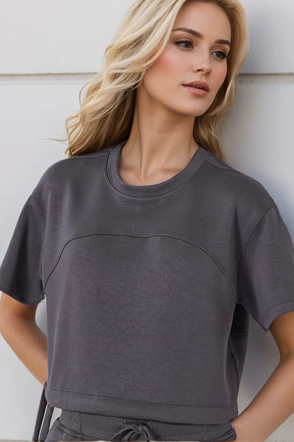 Dark gray drawstring hem scuba t-shirt side view relaxed fit women's everyday fashion