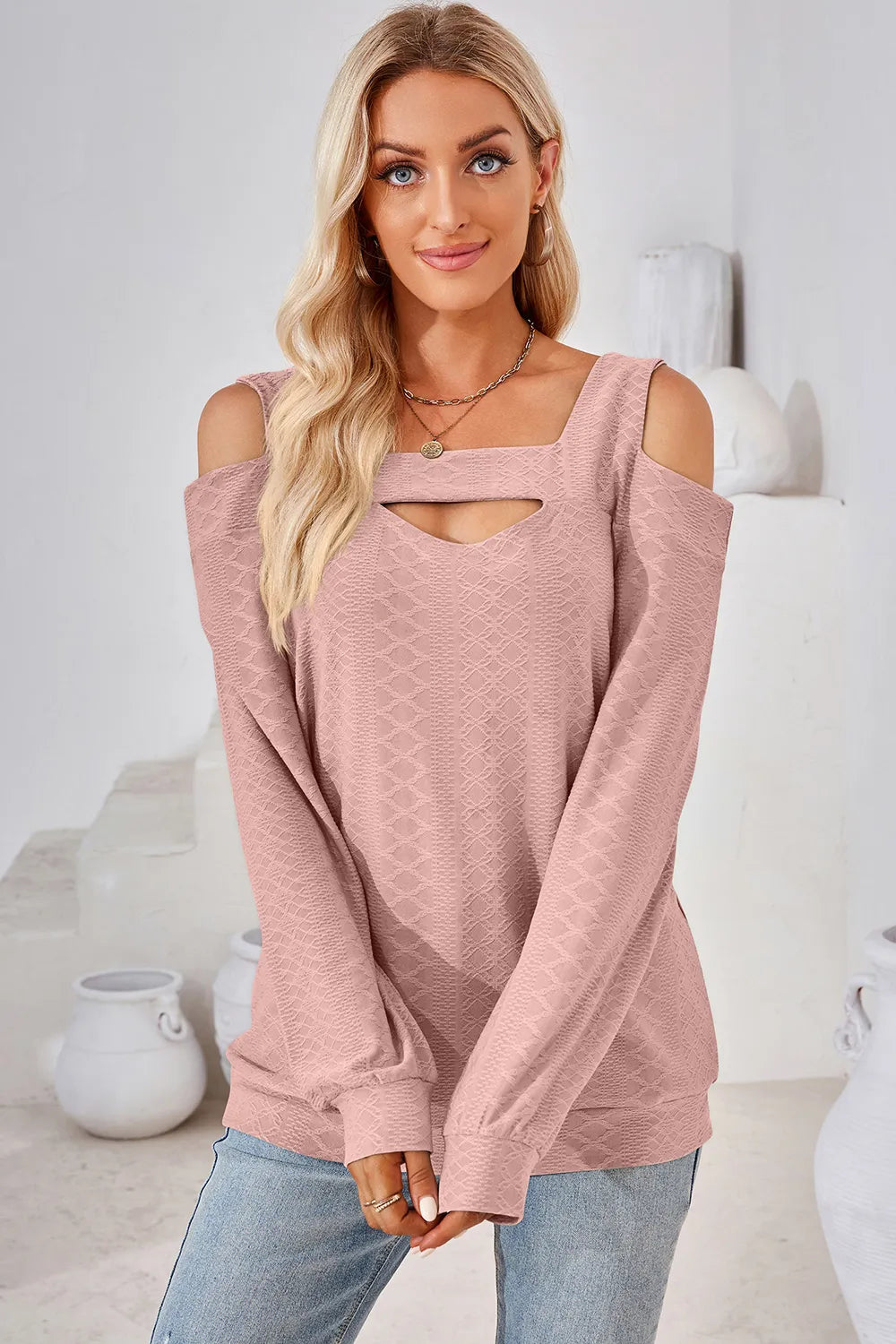 Dusty pink long sleeve cold shoulder top featuring square neckline and shoulder cut out design