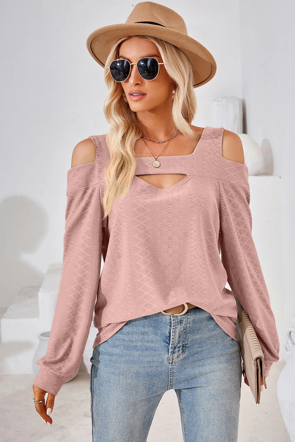 Dusty pink cut out square neck cold shoulder top with long sleeves and feminine styling