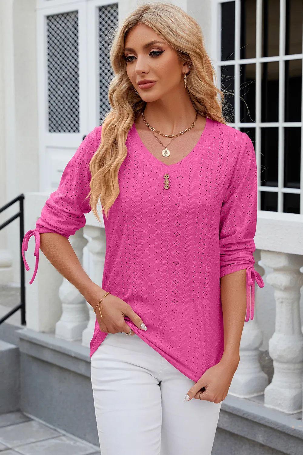 Hot pink half sleeve blouse featuring eyelet embroidery and adjustable drawstring design