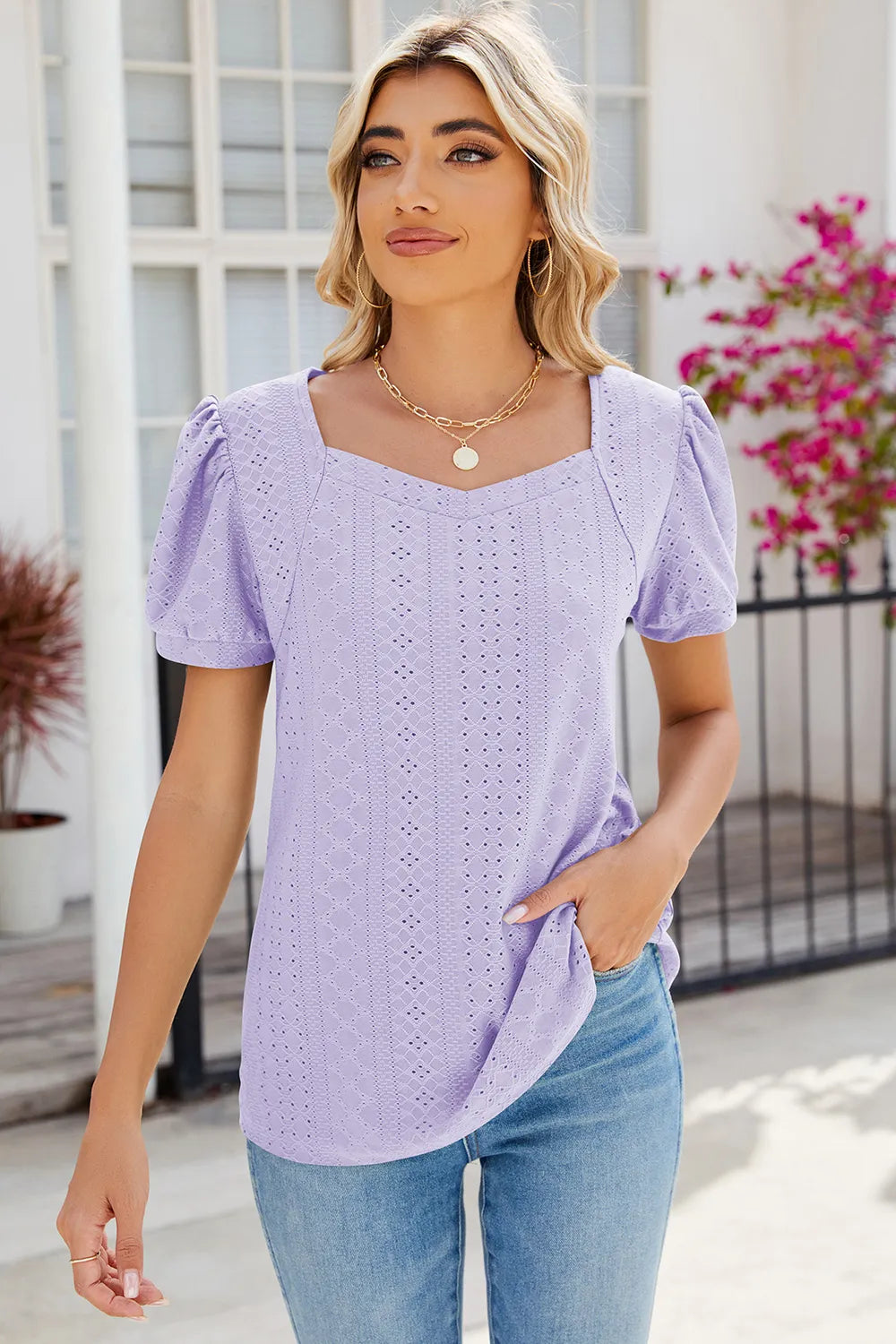 Lavender eyelet top with short puff sleeves and elegant summer styling