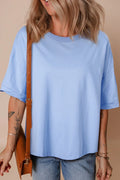 Light blue hi-low hem loose half sleeve t-shirt front view relaxed fit women's casual top UK fashion