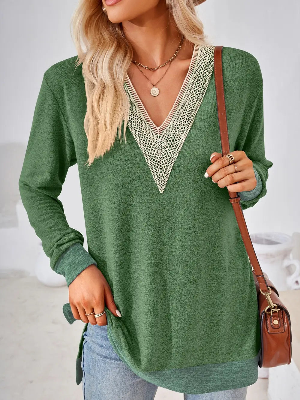 Back view of moss crochet contrast long sleeve top with comfortable silhouette