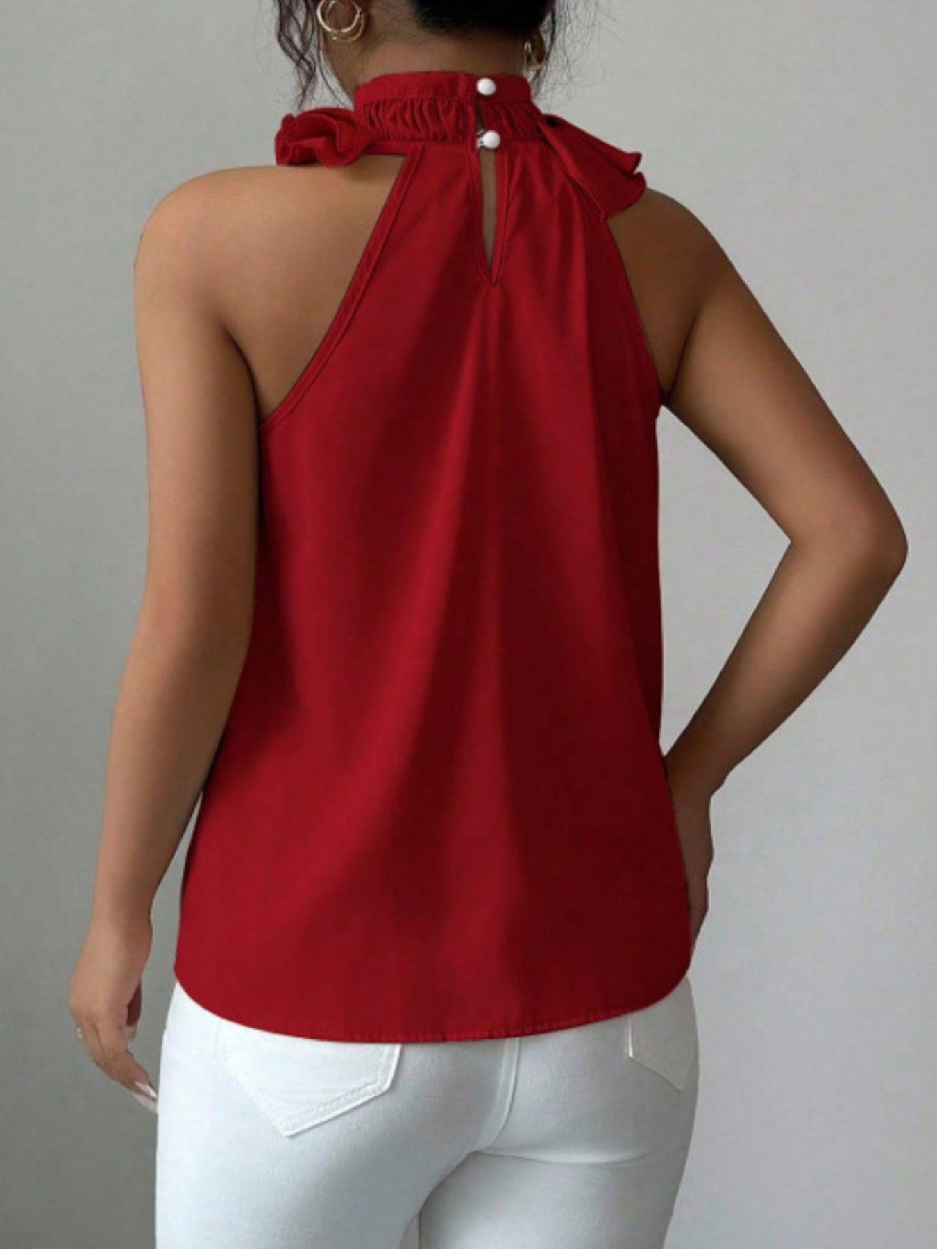 Red sleeveless high neck top back view with clean silhouette and comfortable fit