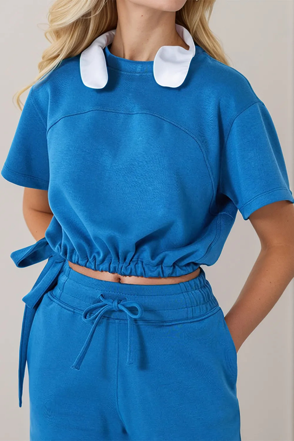 Sky blue drawstring hem scuba t-shirt side profile comfortable everyday women's fashion top