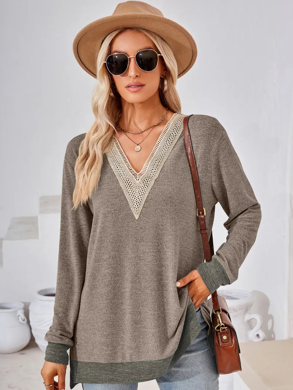 Taupe crochet contrast V neck long sleeve top with lace trim detail and side slit design