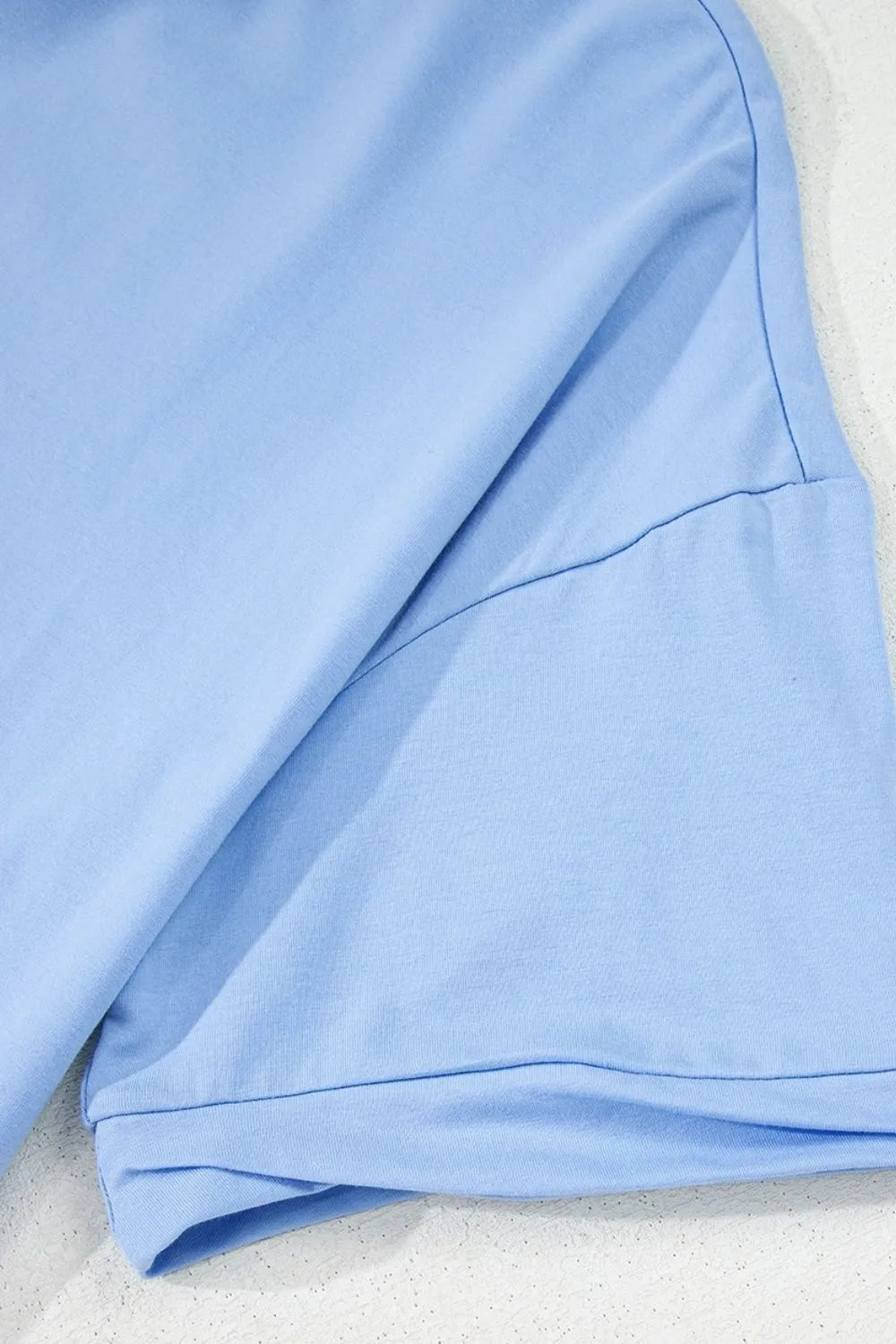Light blue fabric on a white background