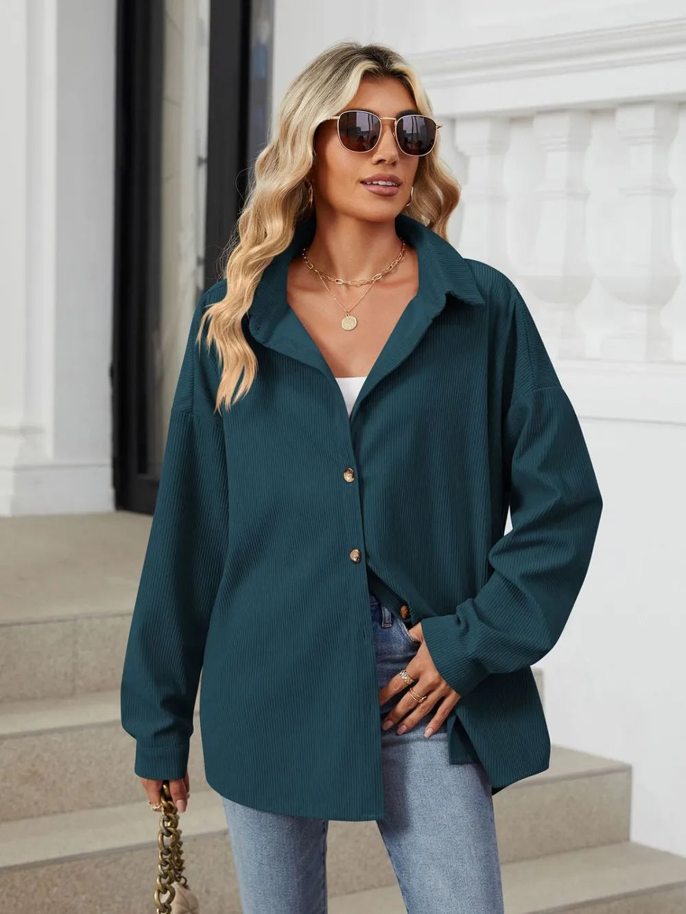 Black forest collared long sleeve shirt styled open over casual denim outfit