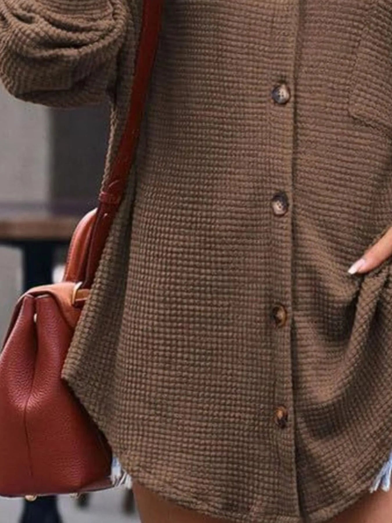 Brown waffle knit button down shirt close up showing chest pocket and button details