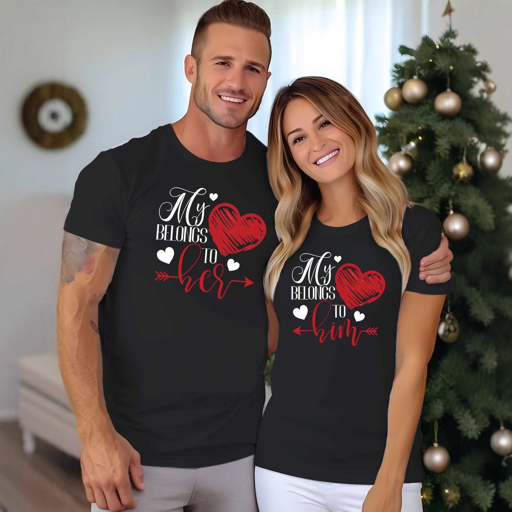 couple-love-print-tee-all-3-colors
All three colors: black, black 1, white matching couple his and hers graphic T-shirts

Man and woman wearing matching black t-shirts with heart designs in a festive indoor setting.