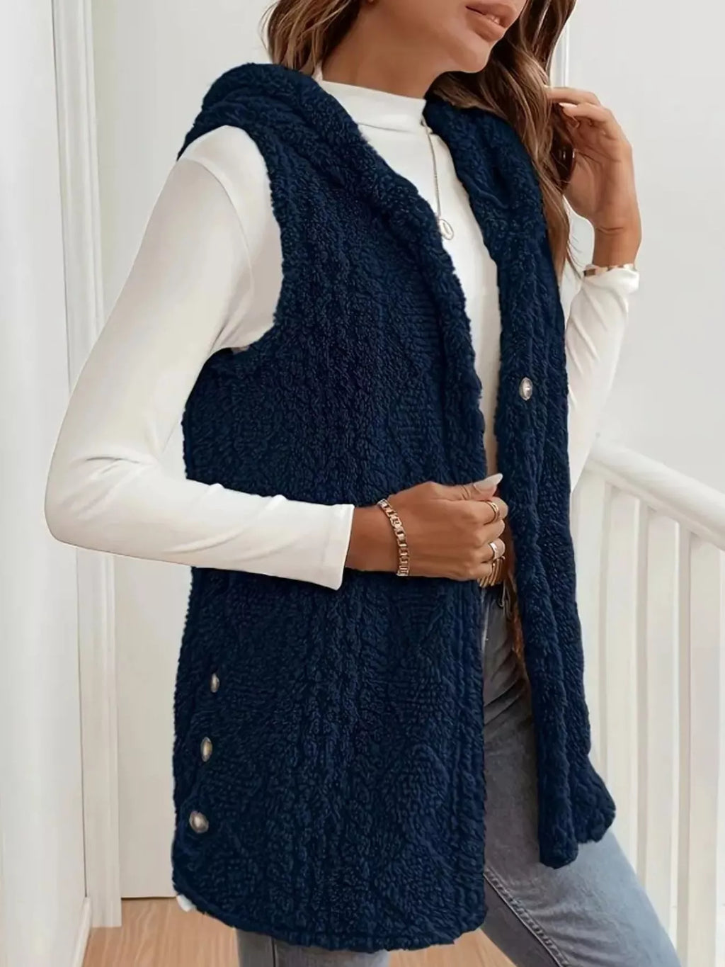 Cute brunch outfit with hooded sherpa vest, white tee and denim skirt