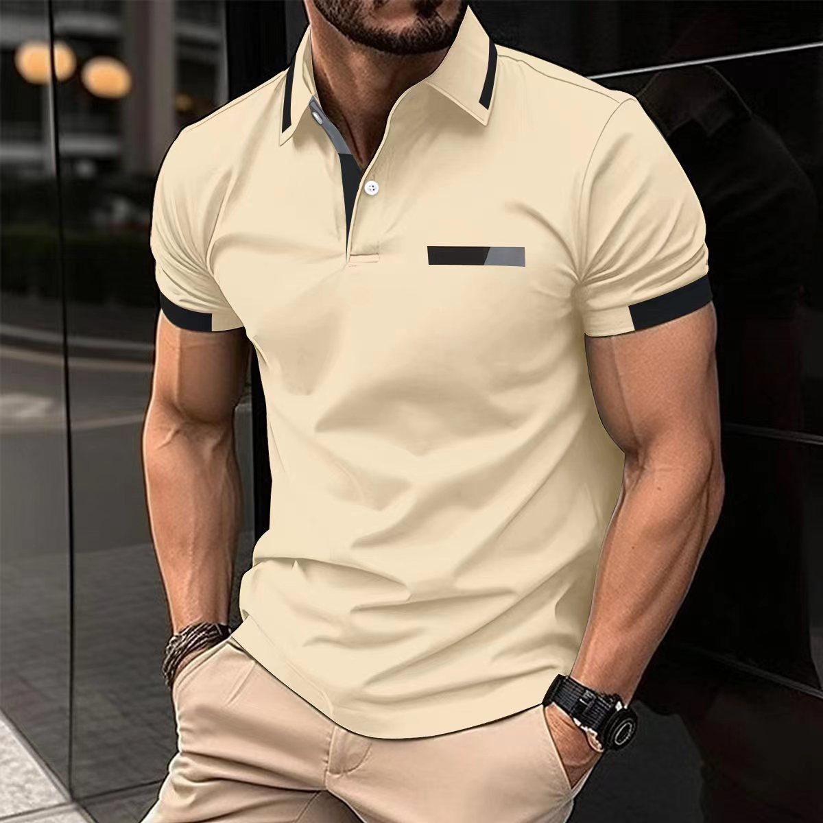 dark-gray-polo-shirt-weekend-look
Dark gray polo shirt styled with denim jacket and jeans for weekend vibes Man wearing a beige polo shirt with black accents in an urban setting