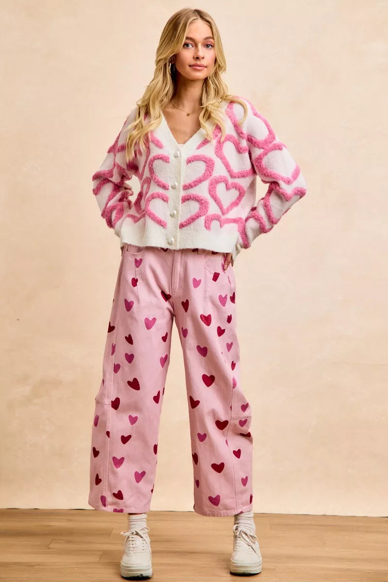 Size chart reference for heart button cardigan S-XL (35-43" bust, 74% acrylic 4% spandex)