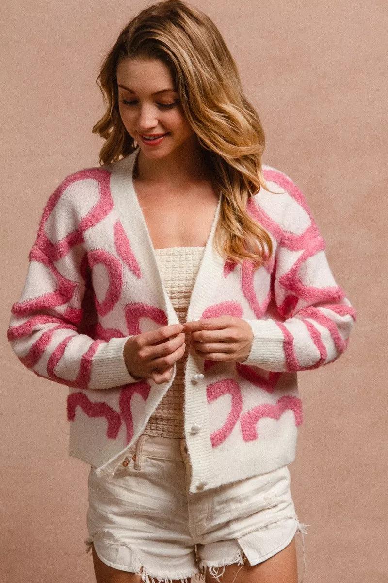 Size L heart button cardigan on model – 39-40" bust, 23.5" length