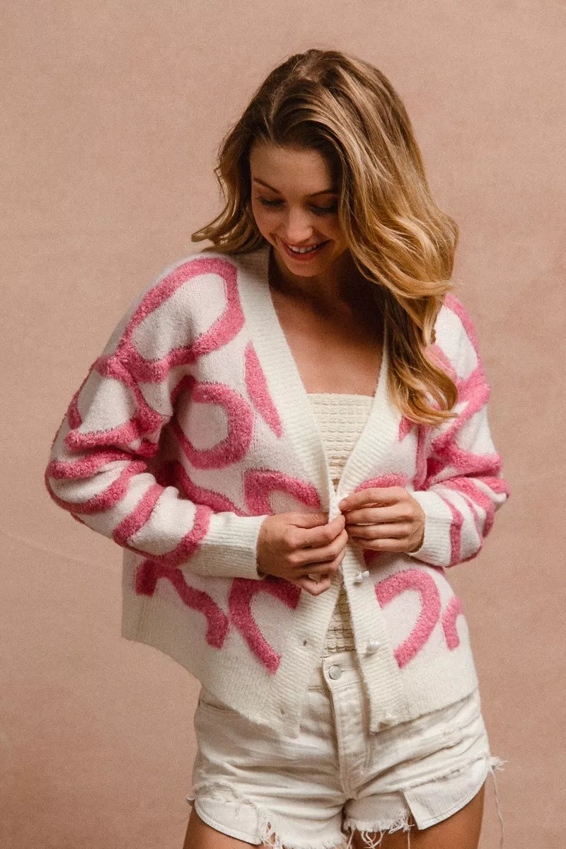 Size S heart button cardigan on model – 35-36" bust, 22" length

