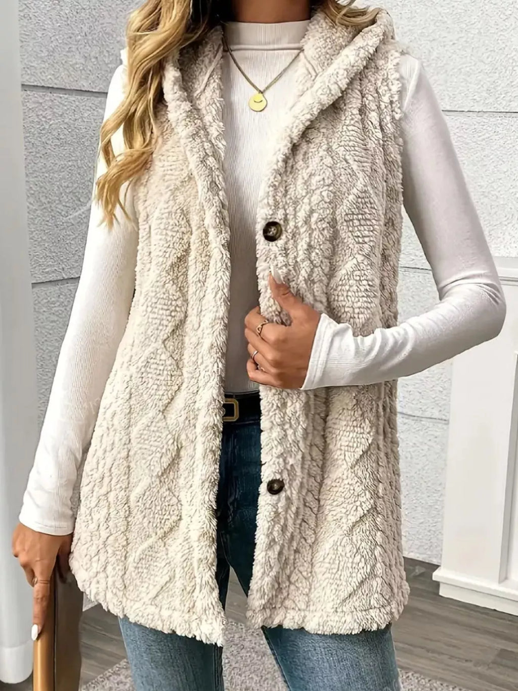Women’s cream hooded sherpa vest coat with button closure, cozy fleece texture