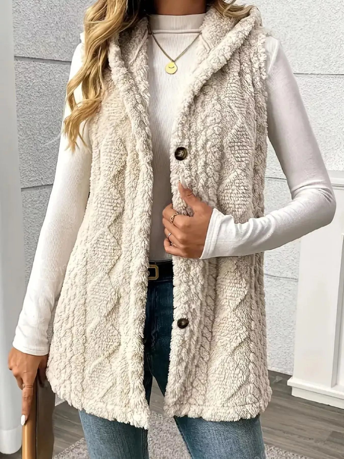 Women’s cream hooded sherpa vest coat with button closure, cozy fleece texture