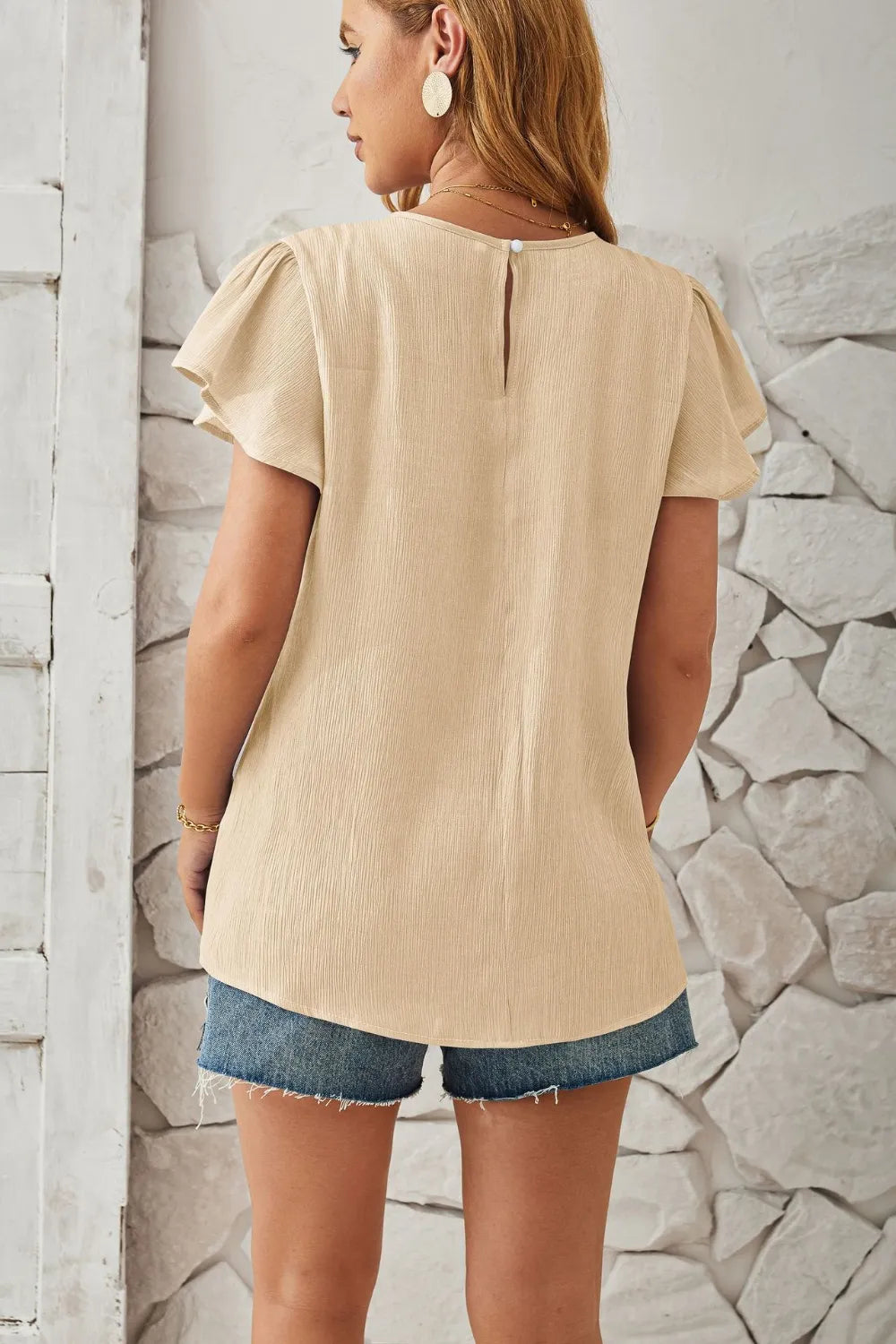 Ivory Keyhole Cap Sleeve Ruffle Top Back View Elegant Flowing Silhouette