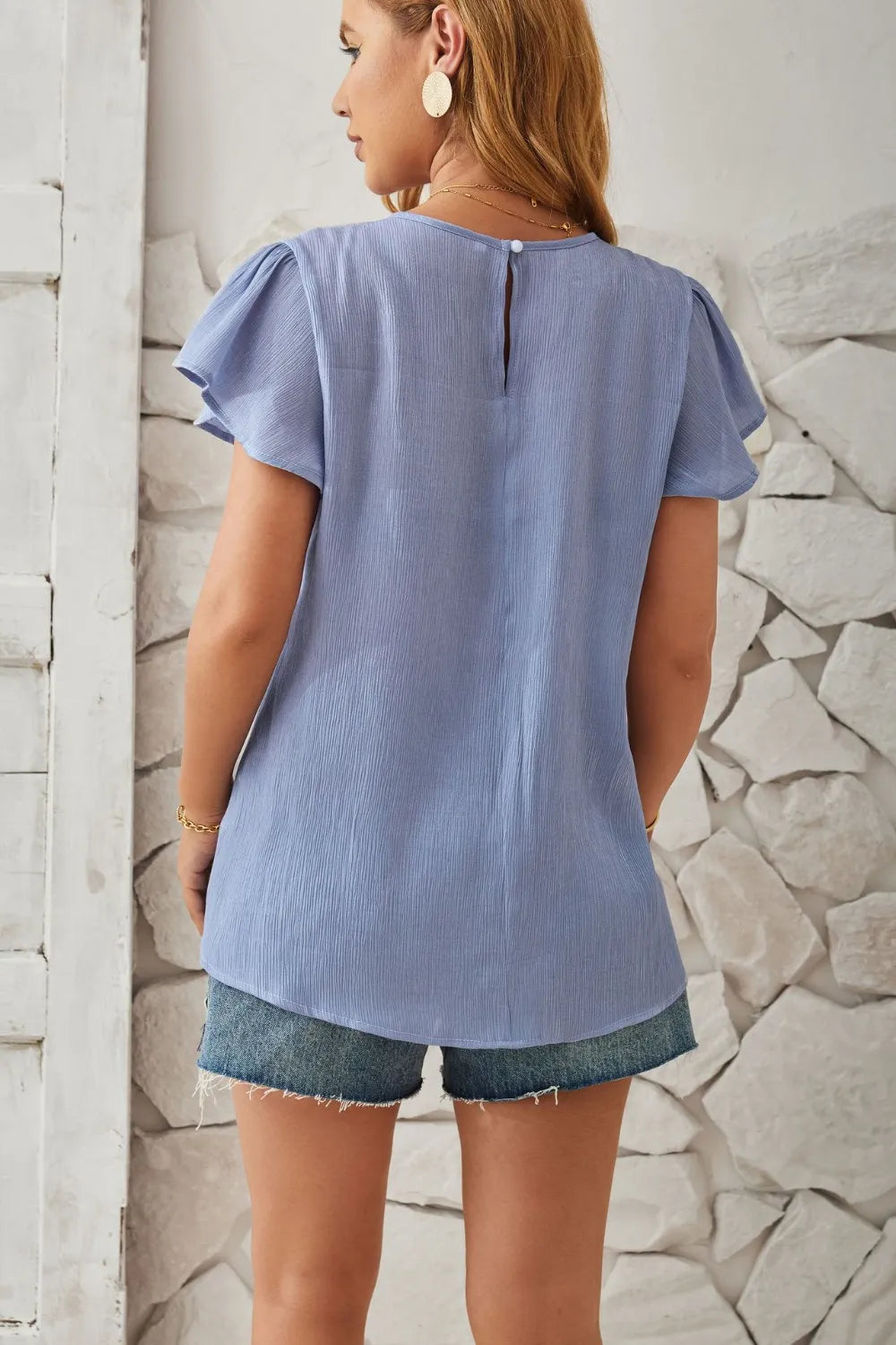 Light Blue Keyhole Cap Sleeve Ruffle Top Neckline And Ruffle Detail