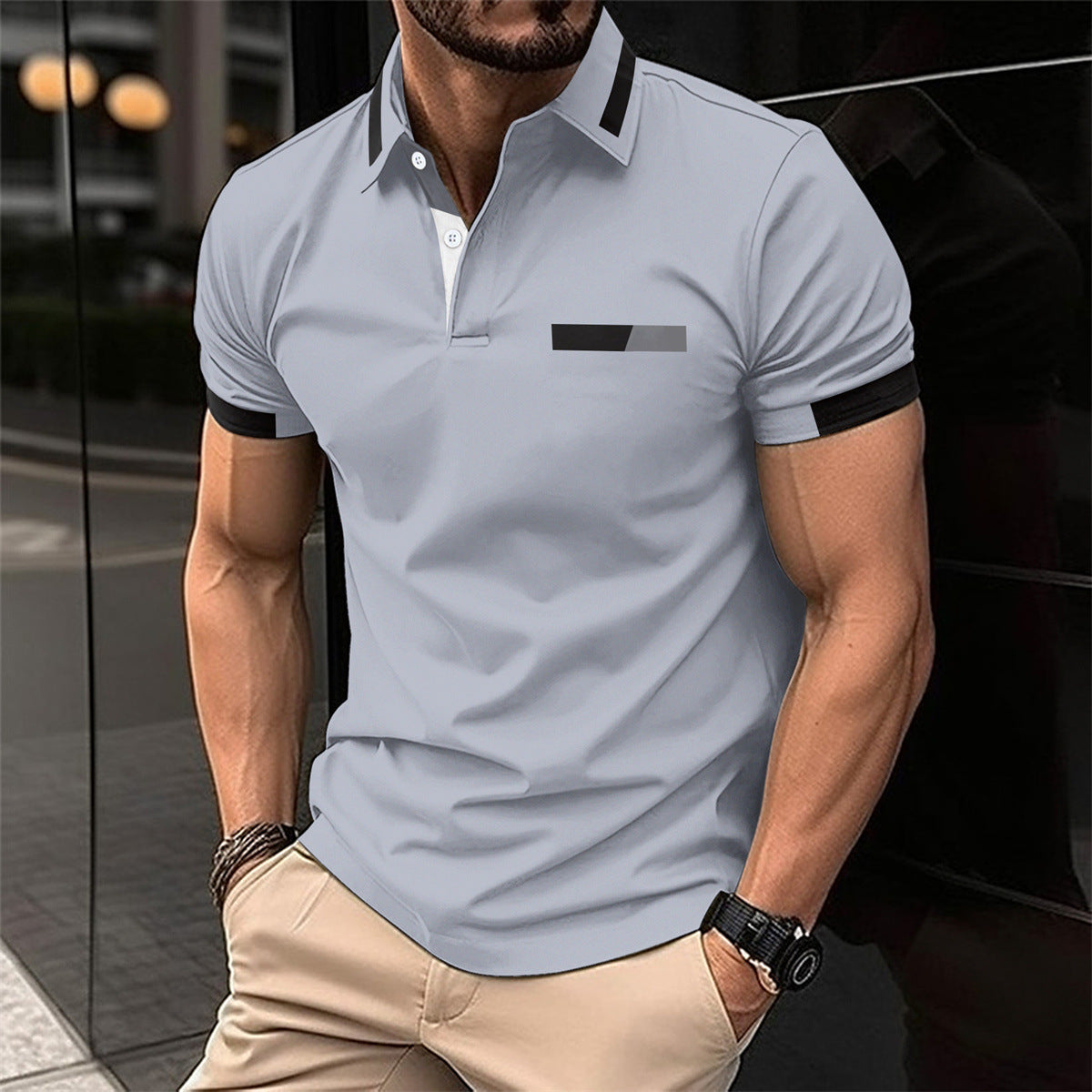 mens-polo-shirt-size-chart-model
Size reference on model wearing size L men’s casual polo shirt

Man wearing a light gray polo shirt with black accents in an urban setting