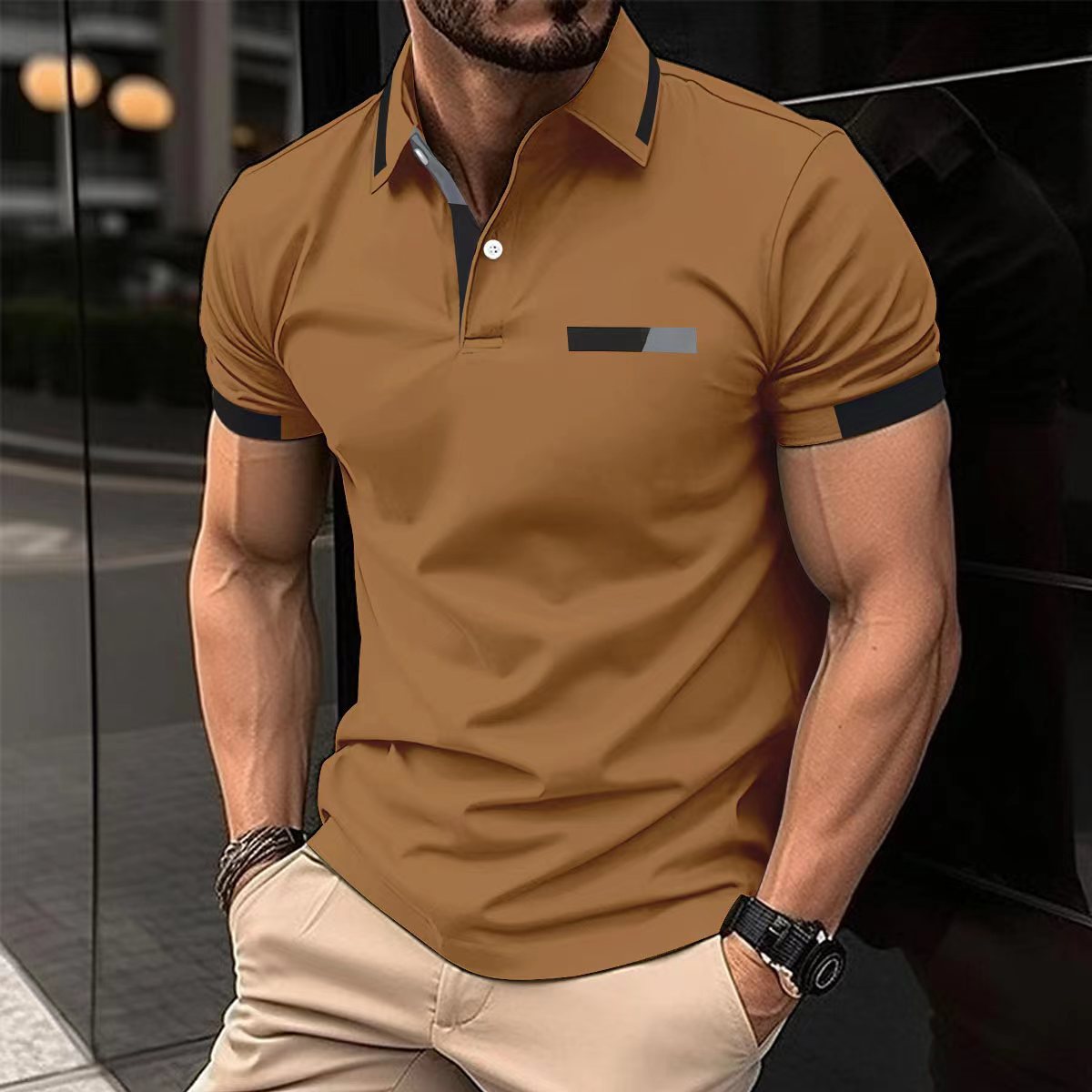 mens-polo-tshirt-blue-smart-casual
Blue casual polo shirt styled with chinos and loafers, ideal smart-casual summer outfit
Man wearing a brown polo shirt with black accents in an urban setting
