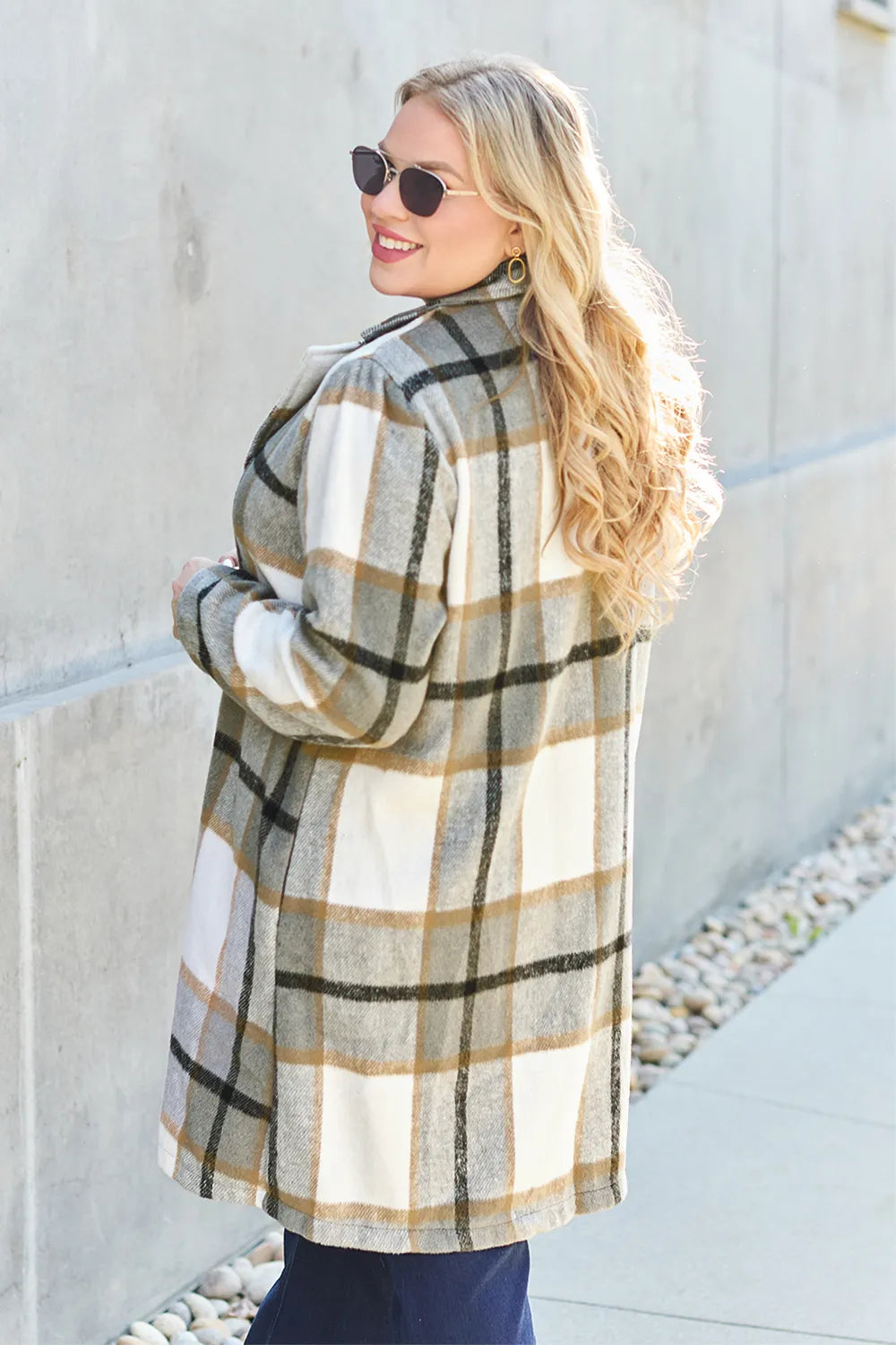 Cozy styling with chunky scarf and pink plaid jacket