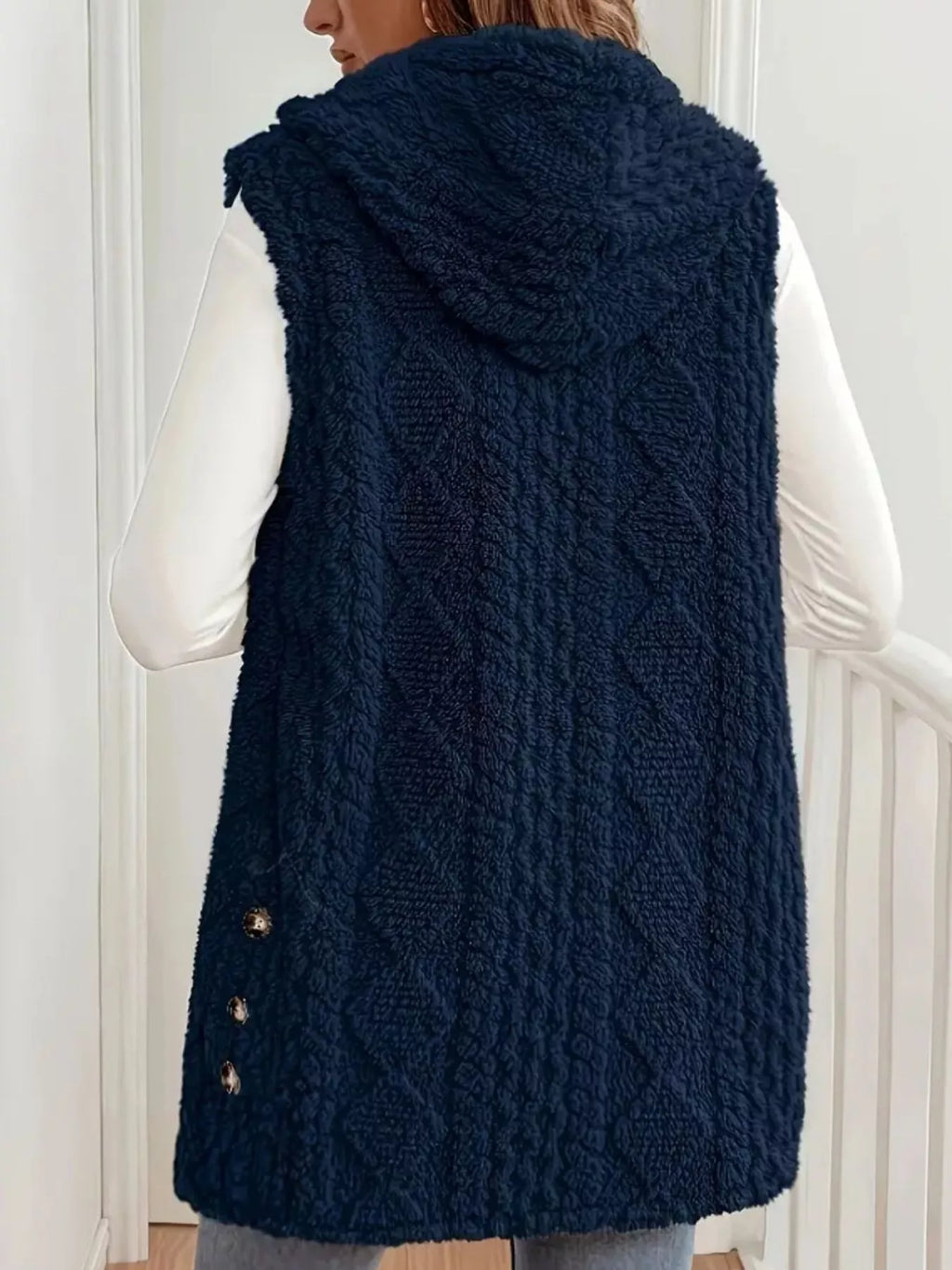 Functional side pockets on cozy hooded sherpa button vest