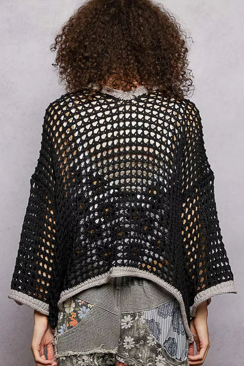 Back view of POL short sleeve open front cardigan with openwork design and loose fit