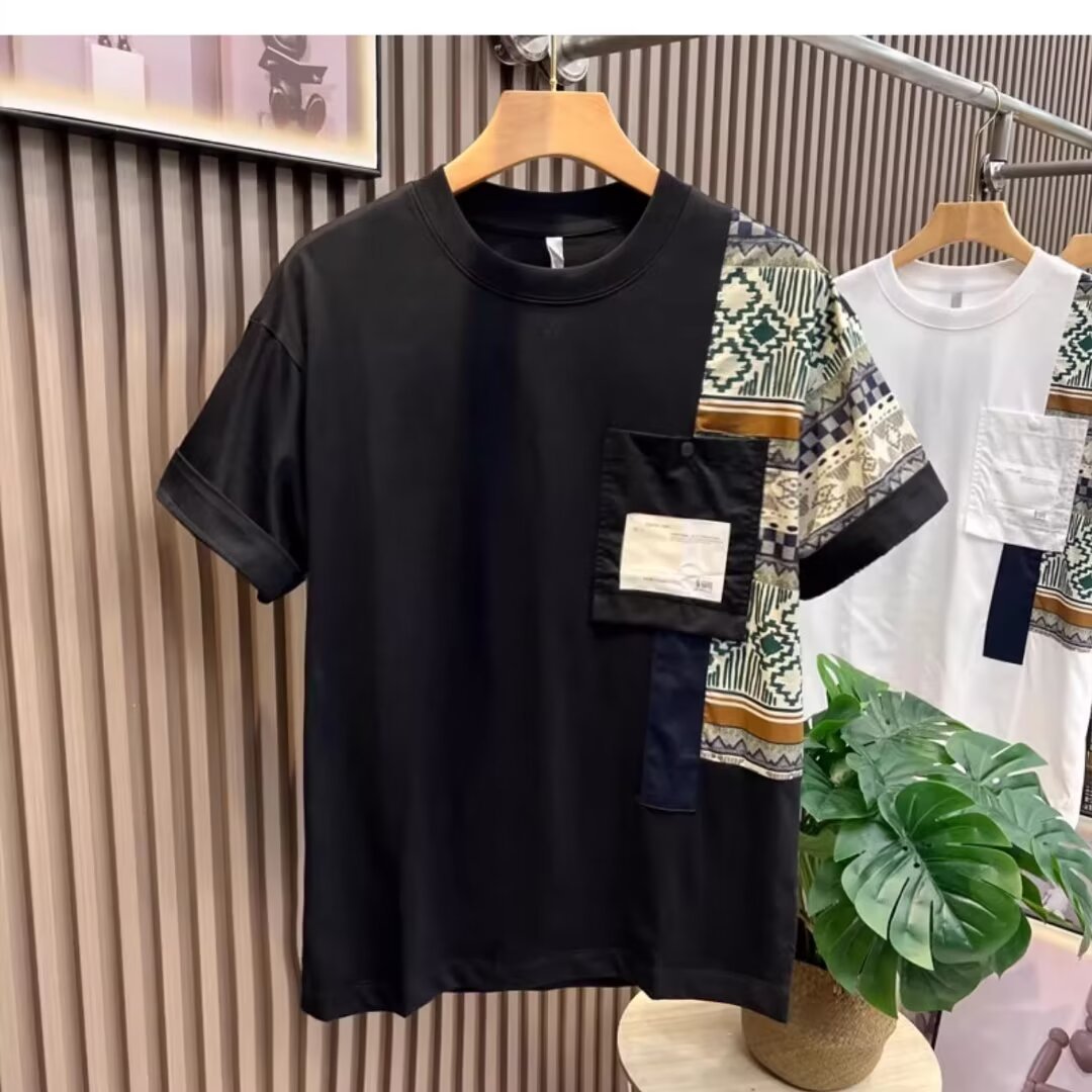 white-camo-patch-tee-back-view
Back view of white slim fit camouflage patch T-shirt showing clean solid design

Black t-shirt with geometric patterned pocket on a hanger against a neutral background