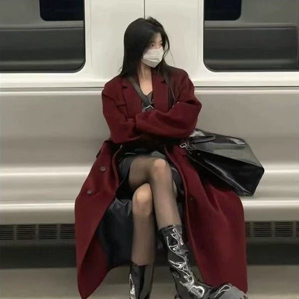 wine-red-long-trench-coat-women-front
Elegant wine red long trench coat for women, loose fit winter overcoat with pockets – OpusVenustas

Person wearing a red coat and black boots sitting on a bench with a mask on.